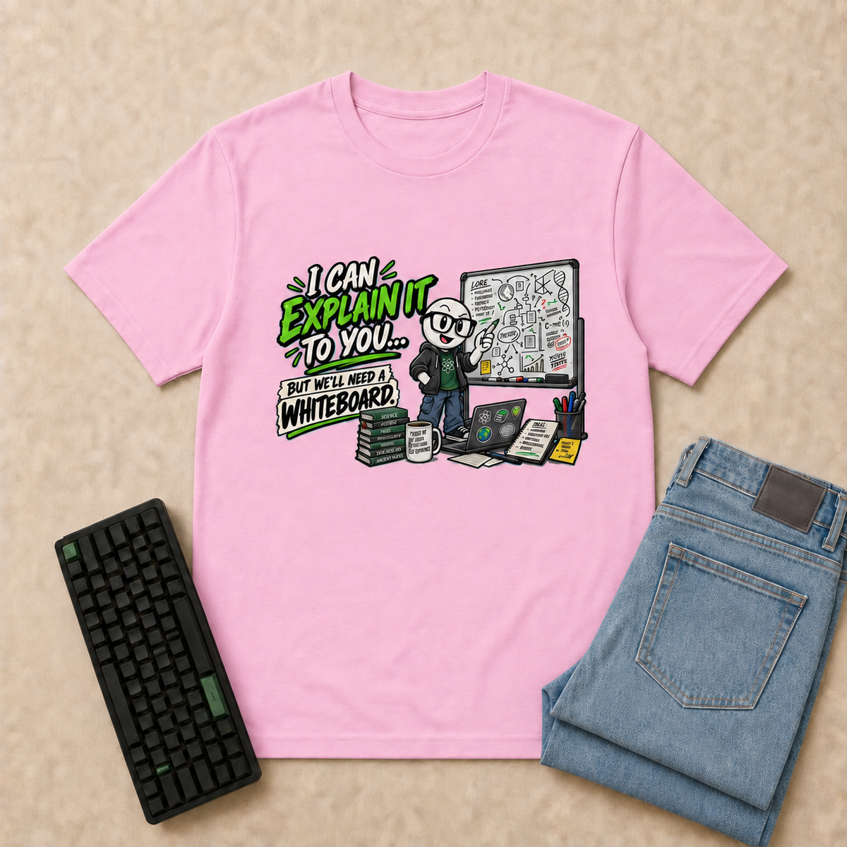 I Can Explain It Nerd Life T-Shirt — Light Pink overhead flat-lay with keyboard and double-folded jeans
