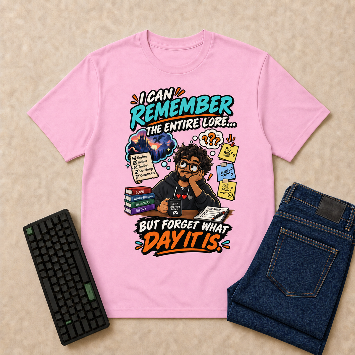 I Can Remember Nerd Life T-Shirt — Light Pink overhead flat-lay with keyboard and double-folded jeans