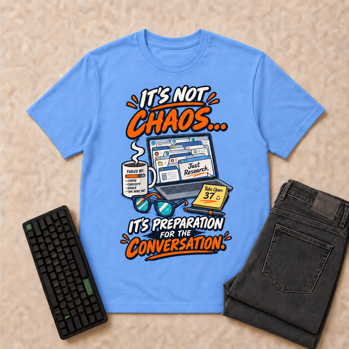 It's Not Chaos — Carolina Blue corrected front flat-lay with keyboard and double-folded jeans