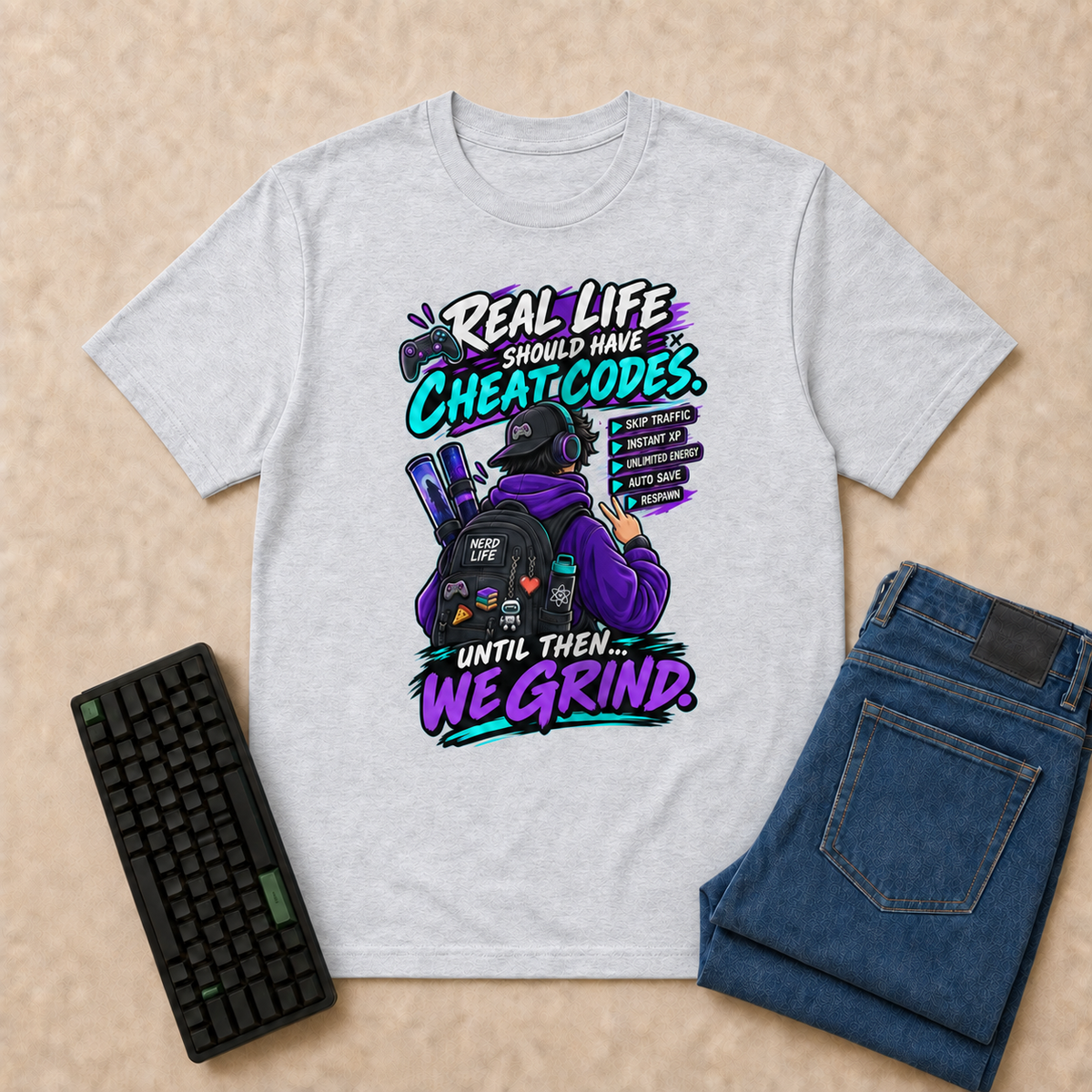 Real Life Nerd Life T-Shirt — Ash overhead flat-lay with keyboard and double-folded jeans
