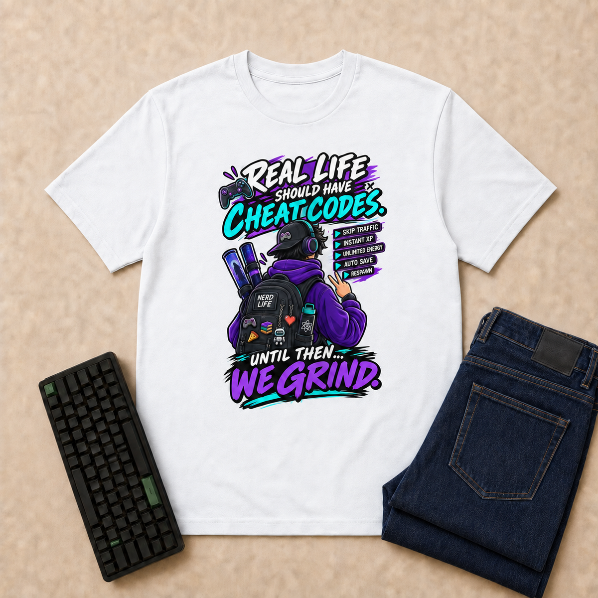 Real Life Nerd Life T-Shirt — White overhead flat-lay with keyboard and double-folded jeans